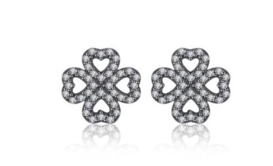 Clover ear studs encrusted in crystals 