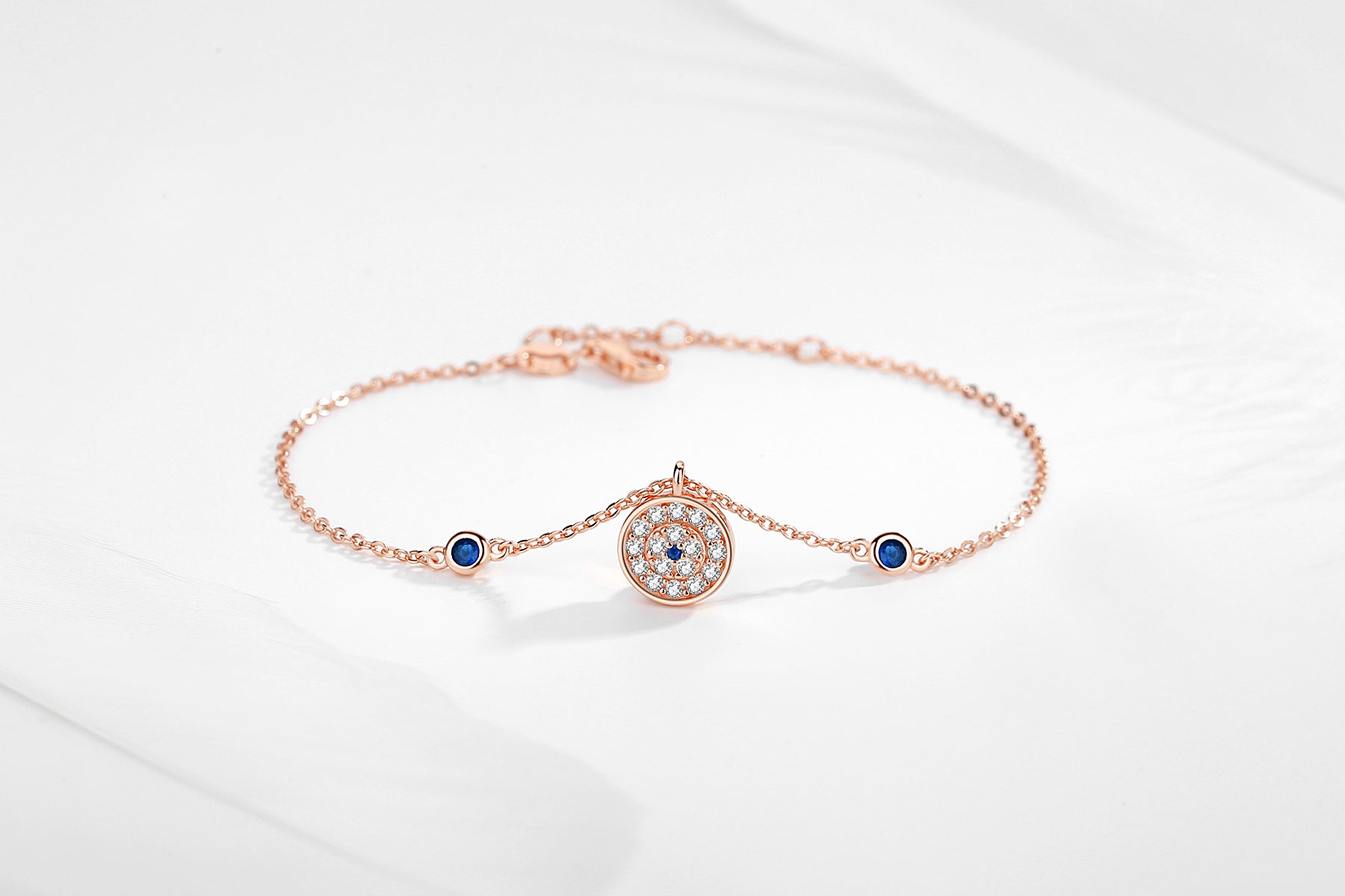 CINDY EVIL EYE ROSE GOLD CHARM BRACELET